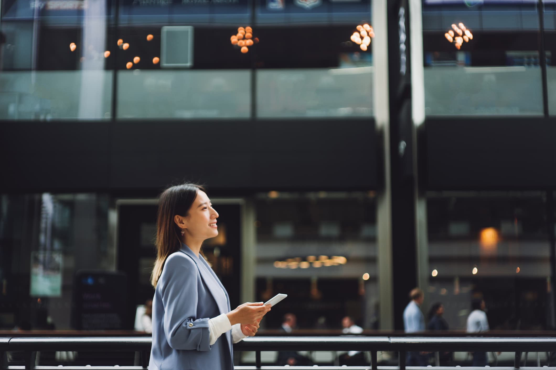woman in front of the bank